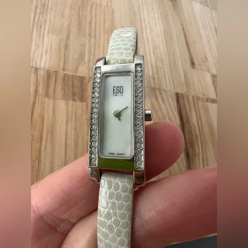 ESQ by Movado ladies skinny silver tone rectangular dress watch NEW BATTERY